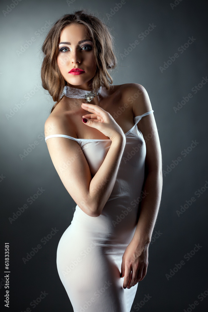 Portrait of sensual model in skin-tight negligee Stock Photo