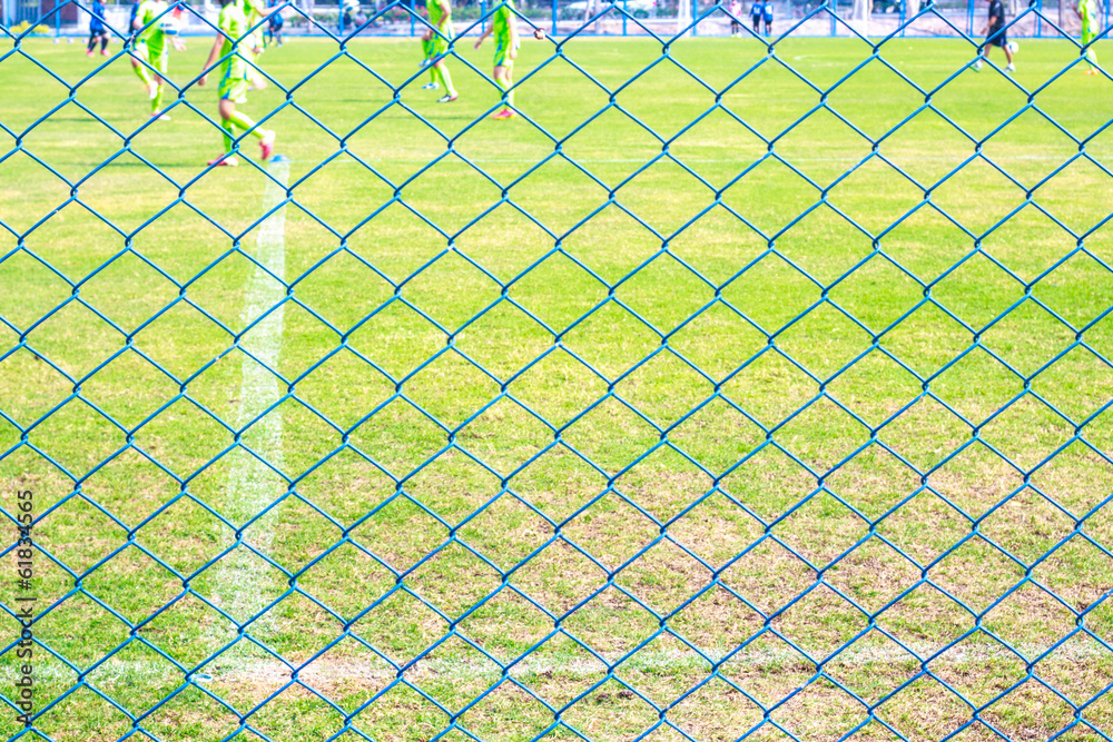 Fototapeta premium wire fence and football yard