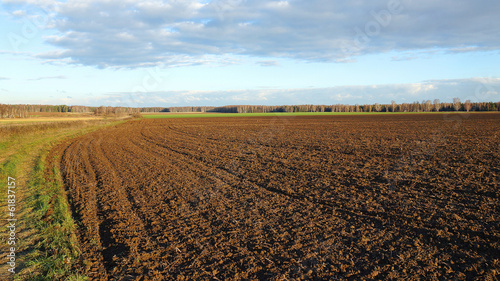agricultural land after cultivation, autumn evening
