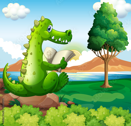A crocodile sitting above the rock while reading near the river