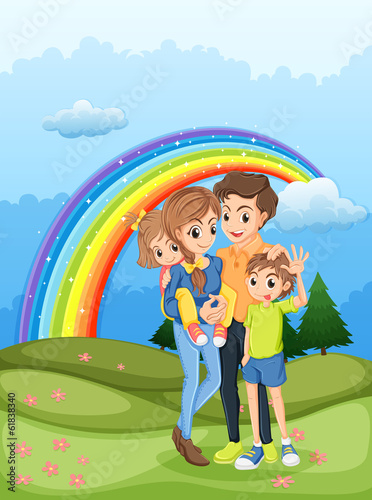 A family strolling with a rainbow in the sky