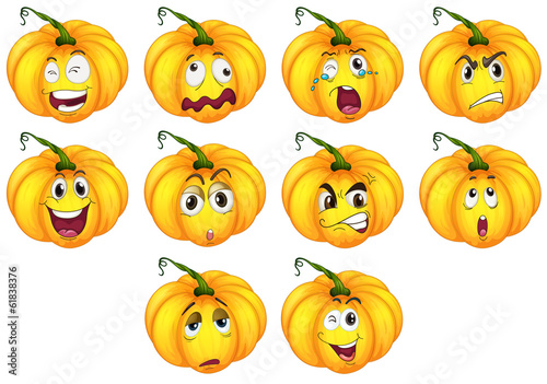 Ten pumpkins with different emotions photo