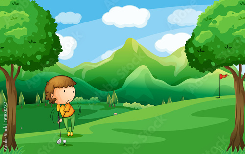 A woman playing golf