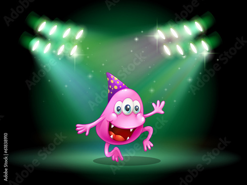 A monster dancing in the middle of the stage