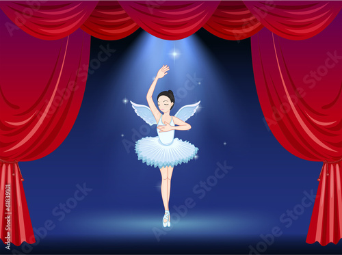 A ballet dancer in the middle of the stage