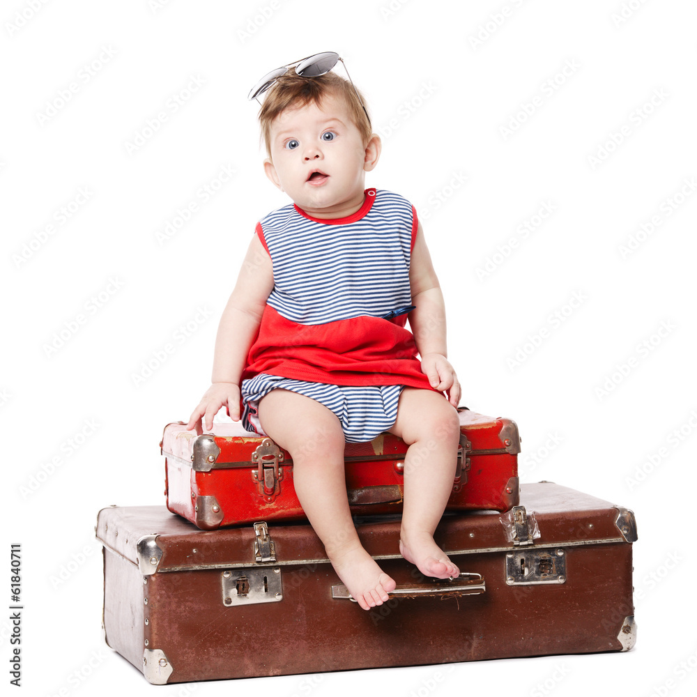 beautiful baby with suitcase isolated on white beautiful baby with suitcase isolated on white
