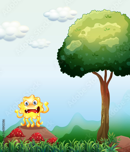 A monster above the rock near the tree
