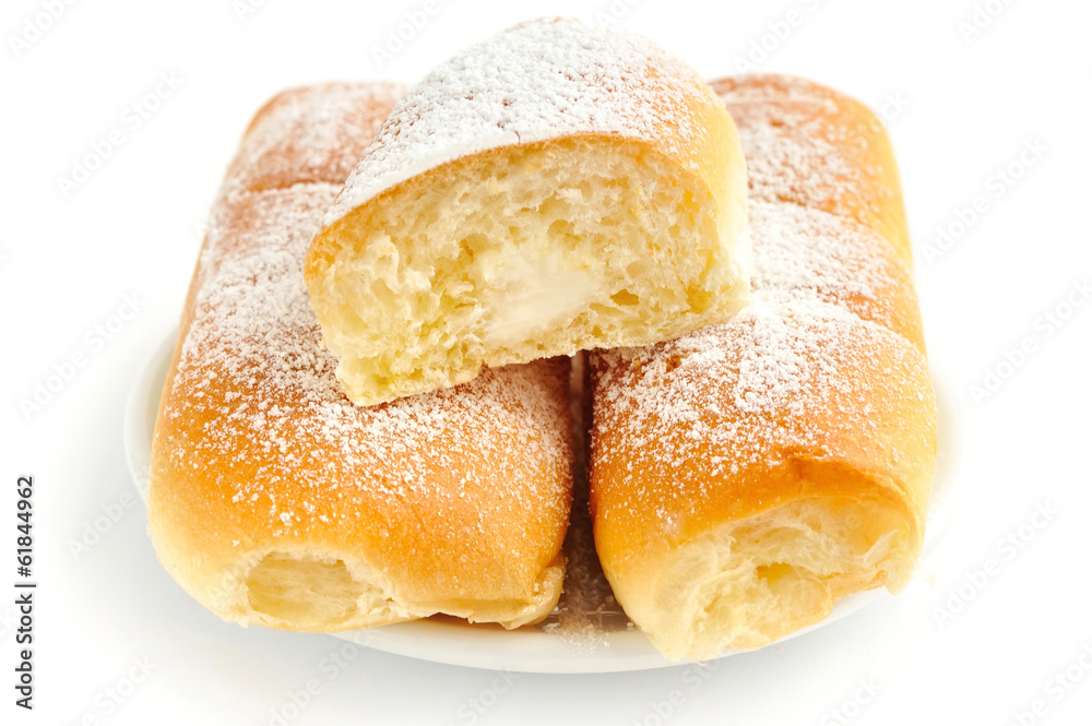 Italian buns with sweet cream on white background