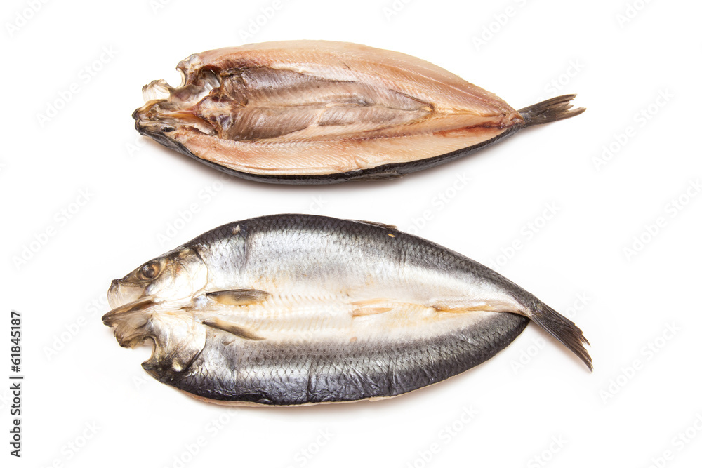 Kippers isolated on a white studio background. Kippers isolated on a white studio background.