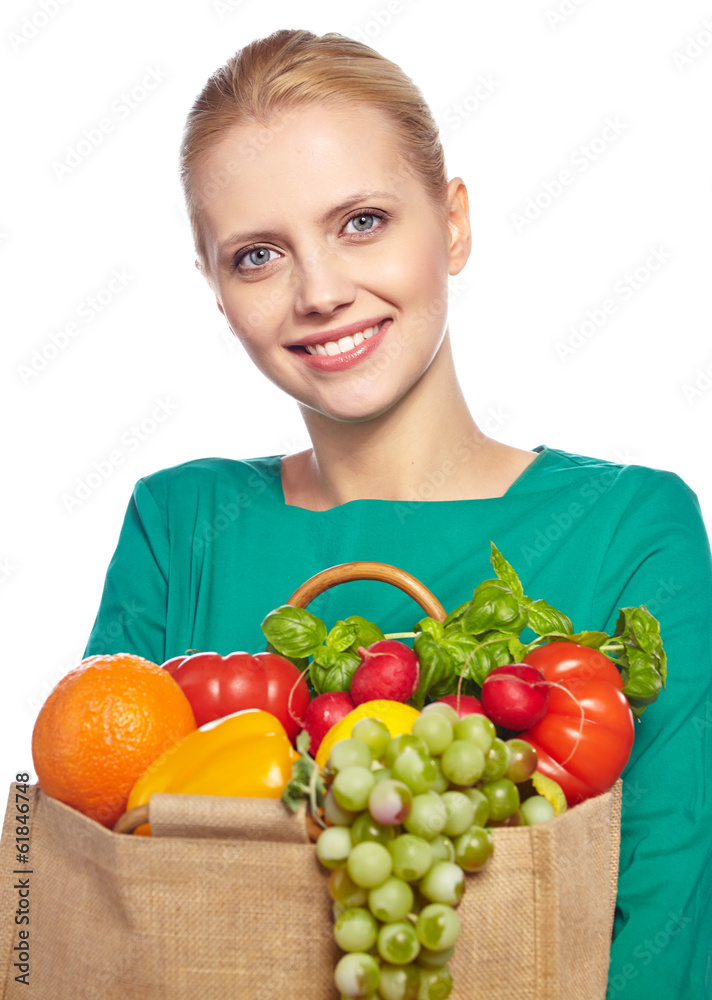 Young woman with a grocery shopping bag. Isolated on white backg Young woman with a grocery shopping bag. Isolated on white backg