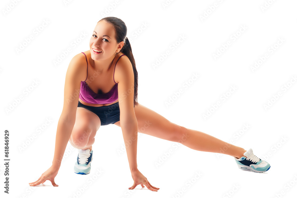 young woman in sportswear does exercises young woman in sportswear does exercises