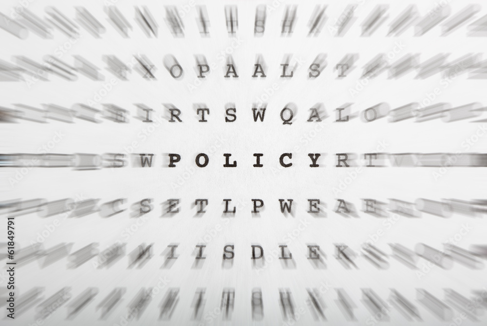 Fototapeta premium Crossword letters, focus on word policy