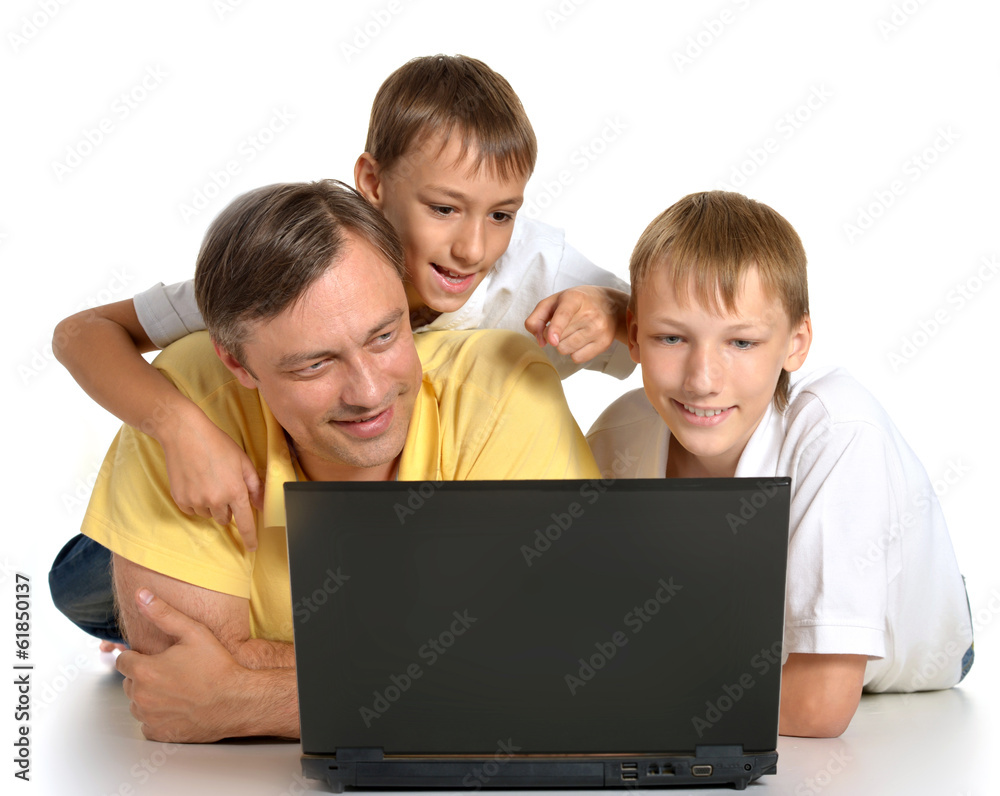 Adorable family with laptop