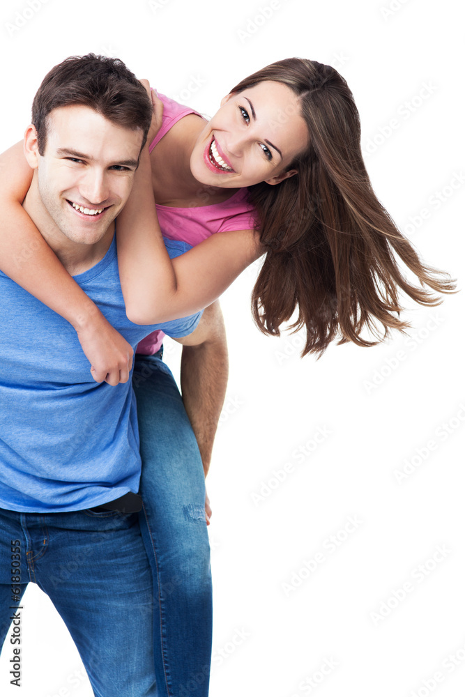 Man giving woman piggyback ride Man giving woman piggyback ride