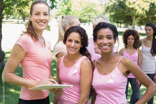 Volunteer and participants at breast cancer campaign