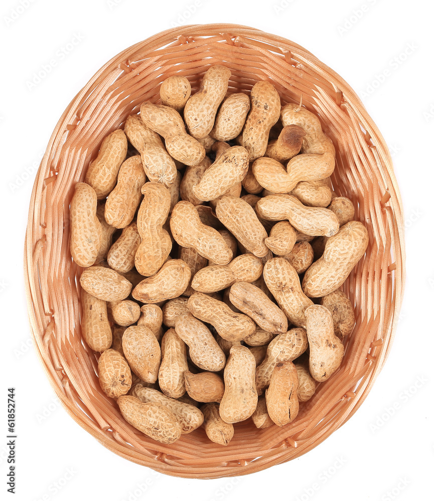 Basket full with peanuts. Basket full with peanuts.