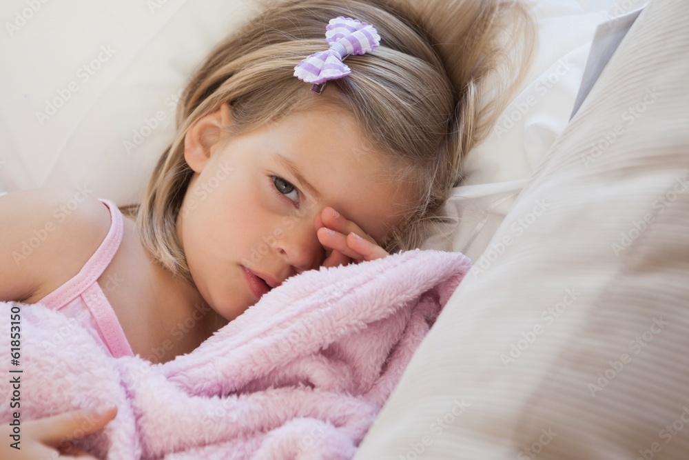 Close-up portrait of a cute girl resting on sofa Close-up portrait of a cute girl resting on sofa