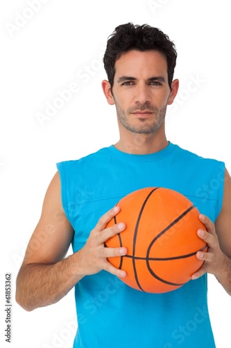 Portrait of a basketball player with ball