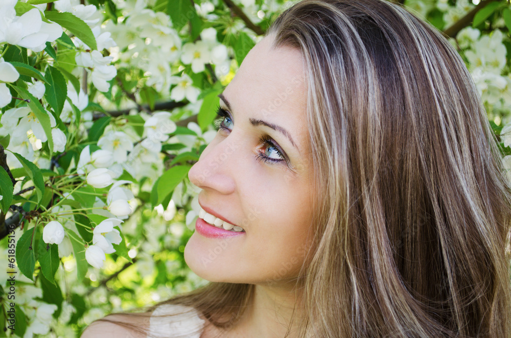 Portrait of beautiful woman with apple tree flowers Portrait of beautiful woman with apple tree flowers