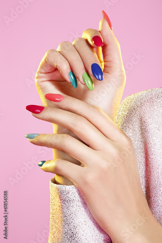 Beauty shot of model wearing colorful nail polish