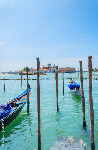 Bild auf Leinwand Gondolas on the docks in Venice
