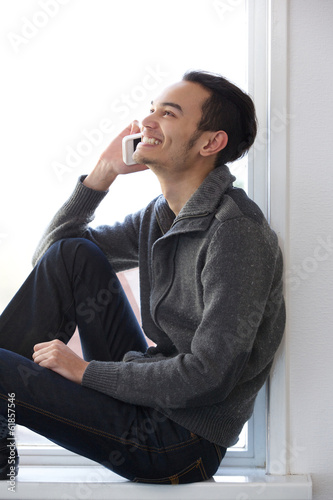 Young man talking on mobile phone