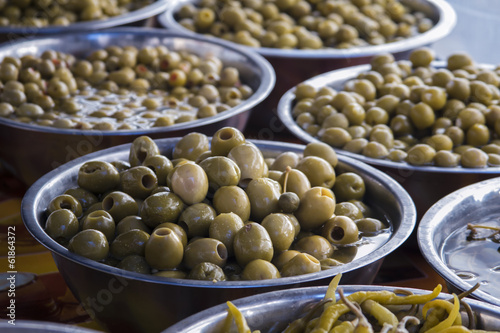 Bowls of olives for sale at a market