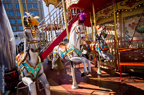 Old-style carousel with ponies
