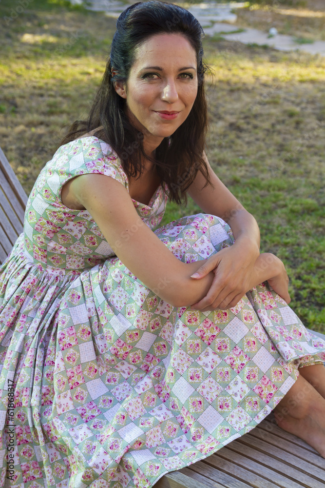 Woman gardening. Mature girl gardening in her backyard. spring s Woman gardening. Mature girl gardening in her backyard. spring s