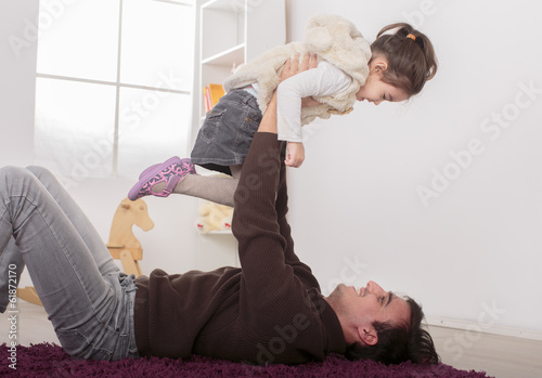 Father and daughter playing...