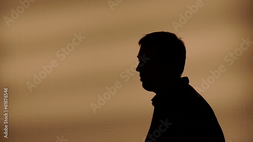 Male silhouette talking