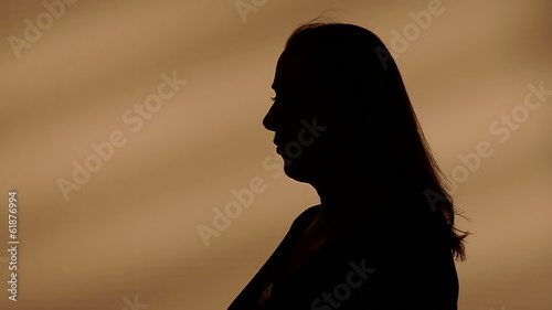 Female silhouette talking