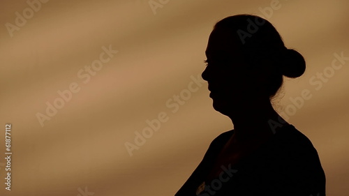 Female silhouette talking