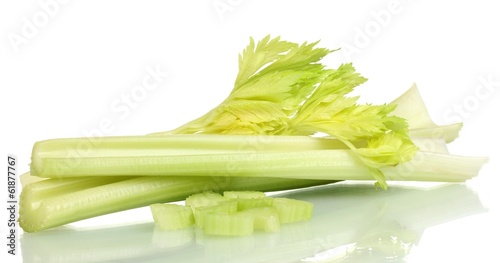 fresh slised green celery isolated on white.
