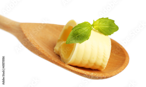 Curl of fresh butter with basil