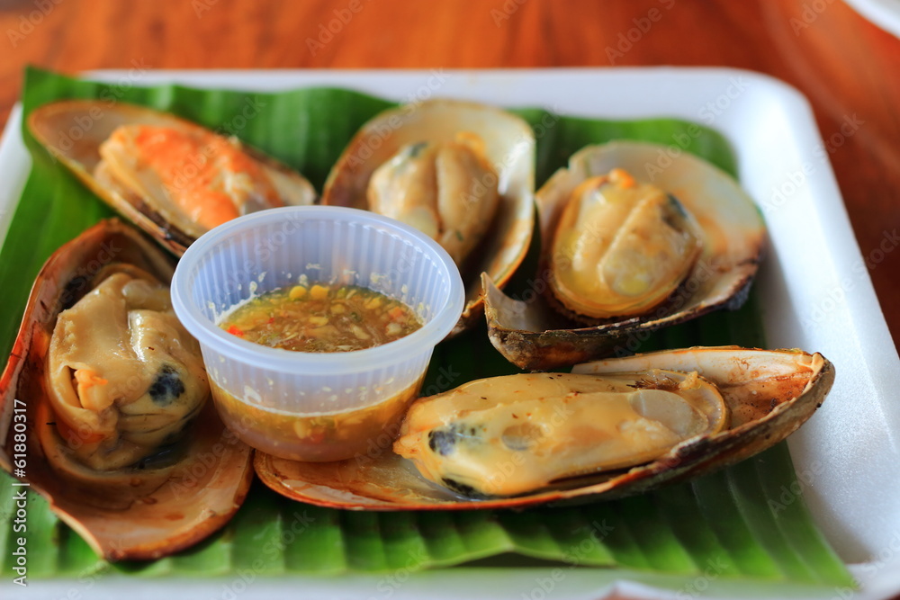Grilled mussels and seafood sauce