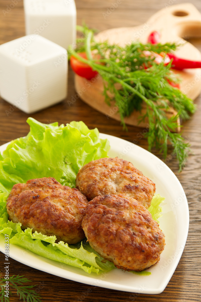 Large fried cutlets with lettuce Large fried cutlets with lettuce