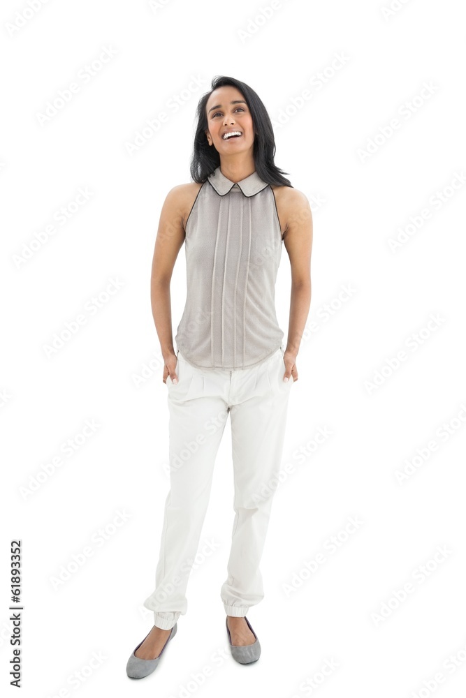 Happy young woman looking up Happy young woman looking up