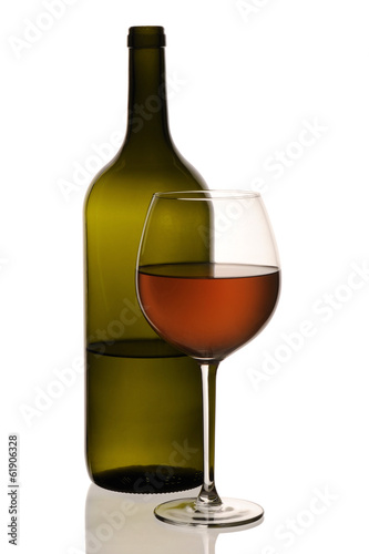 Special orange wine bottle with glass