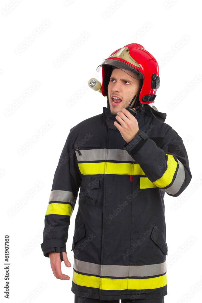 Firefighter using walkie-talkie Firefighter using walkie-talkie