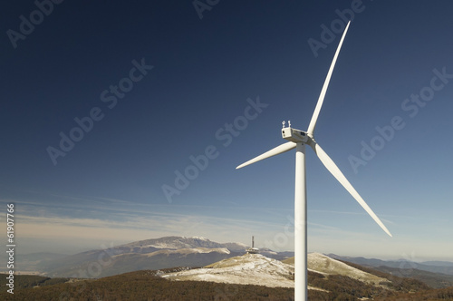 Wind turbines with beautiful landscape behind