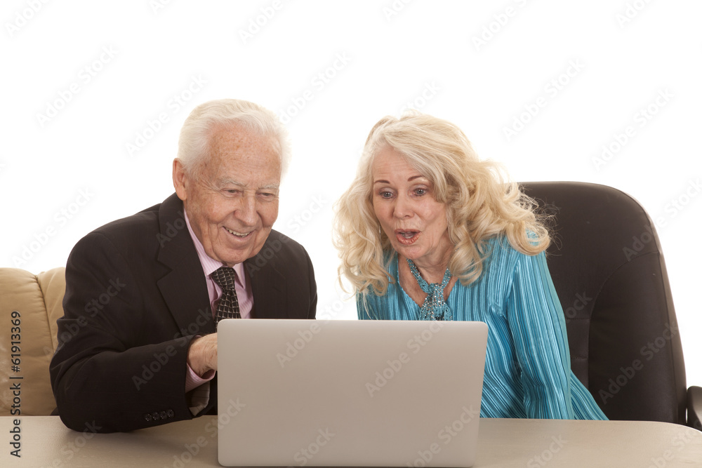 Elderly couple business she looks shocked