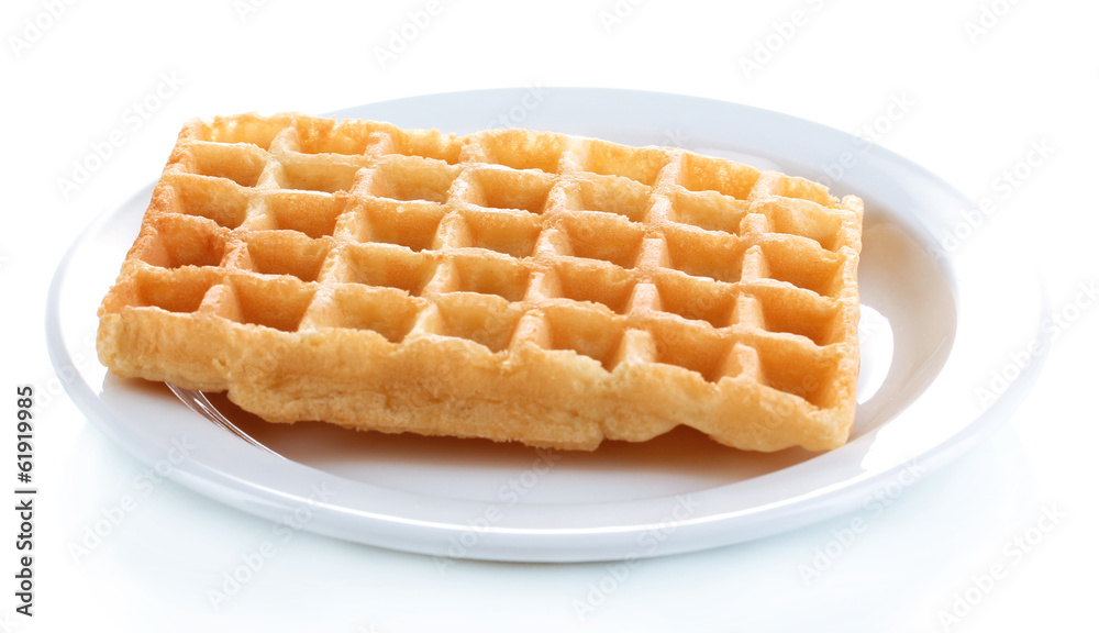Sweet waffles on plate isolated on white Sweet waffles on plate isolated on white