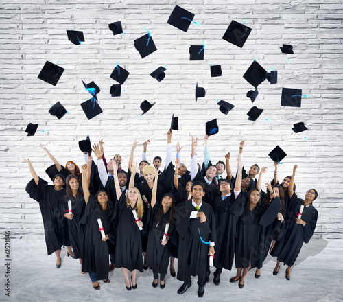 Group of Graduating Students Throwing Caps in The Air