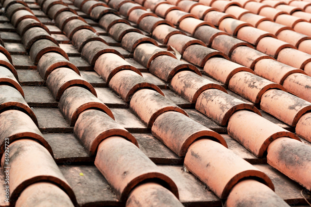 Close up of red roof tiles.