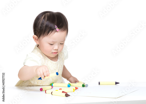 Asian little girl concentration on drawing