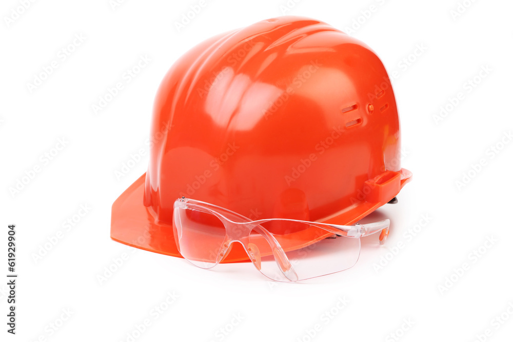 Red hard hat and glasses. Red hard hat and glasses.