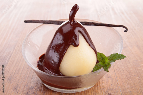 poached pear with chocolate photo