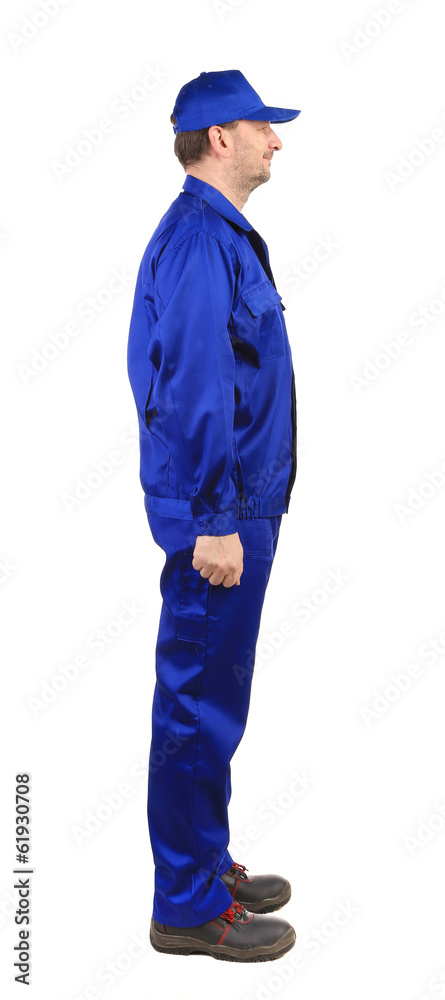Worker in blue workwear. Worker in blue workwear.
