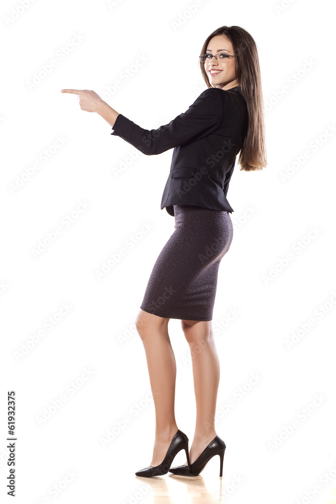 business woman pointing with her finger on empty space business woman pointing with her finger on empty space